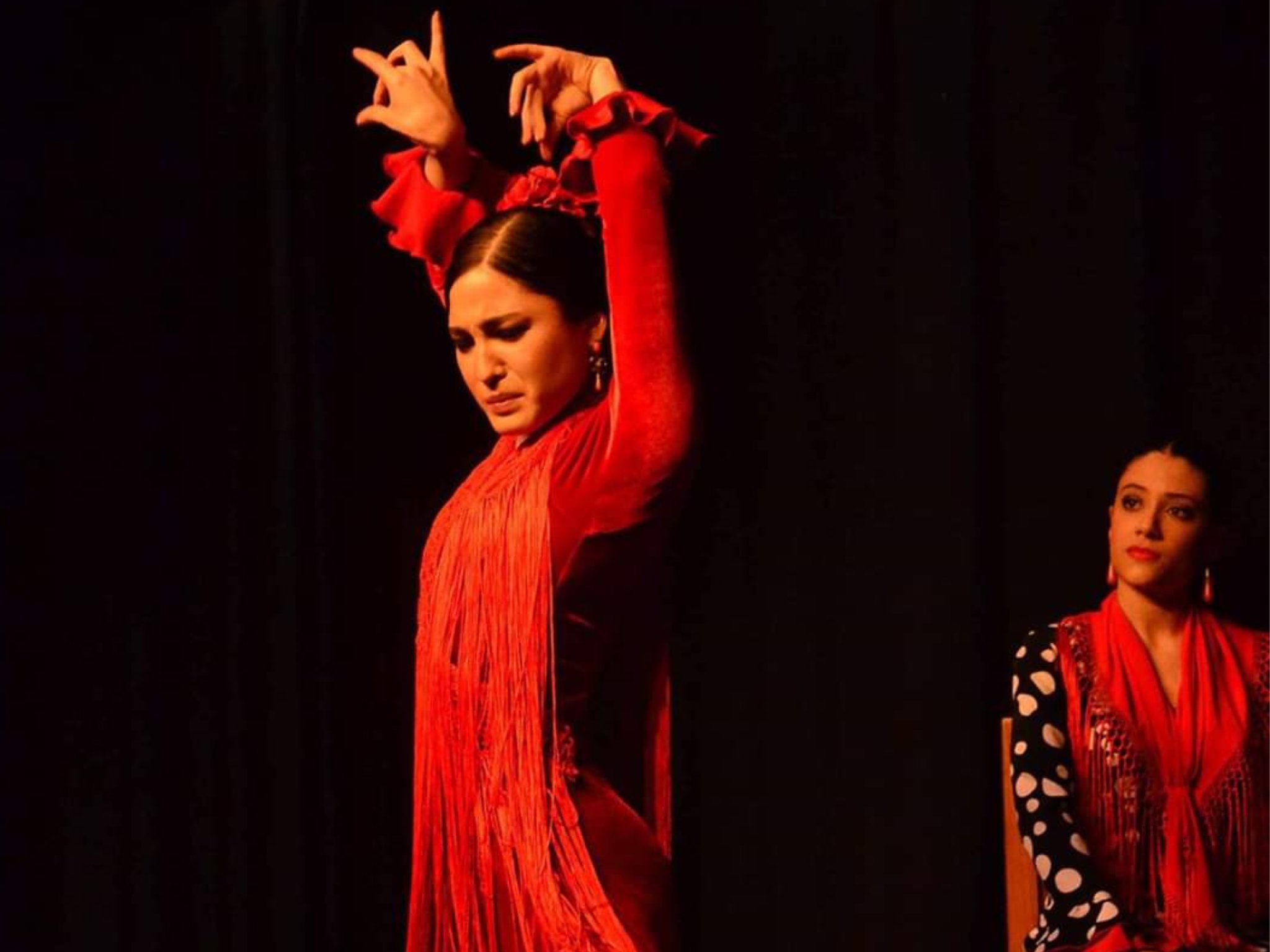 Flamenco dance class Seville for kids — children learn basic flamenco steps in a hands-on family lesson